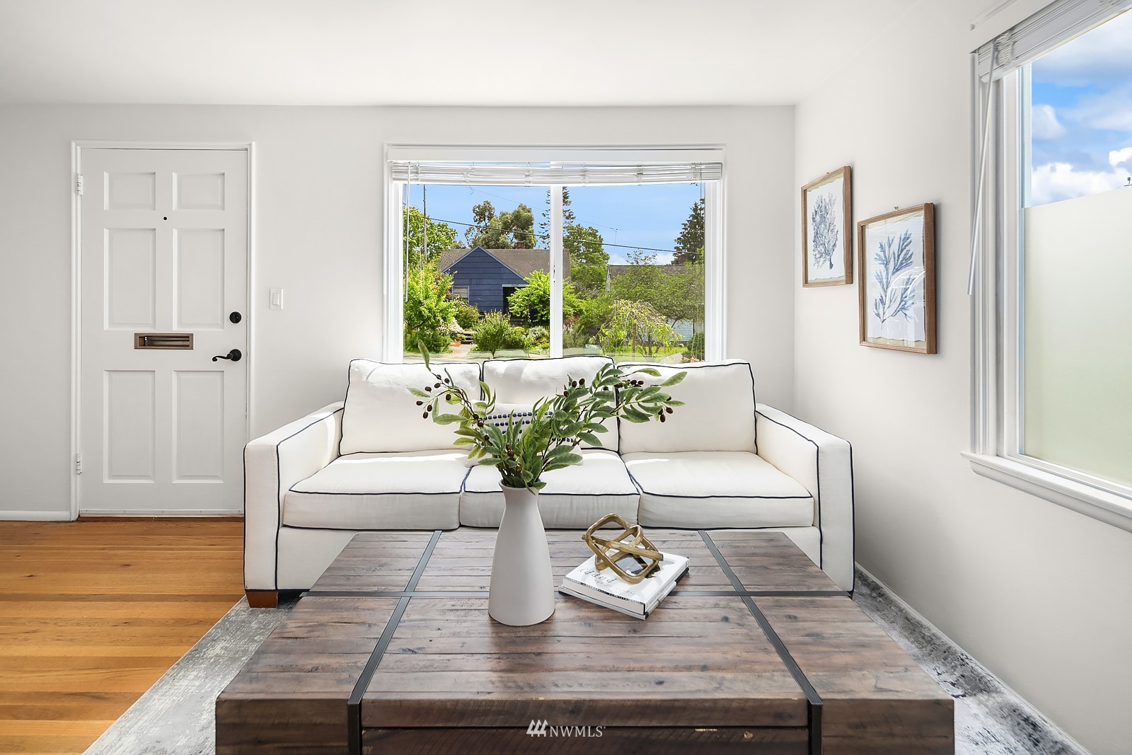336 Northwest 47th Street Seattle, WA 98107 - Photo 7 of 36 a living room with furniture and a window
