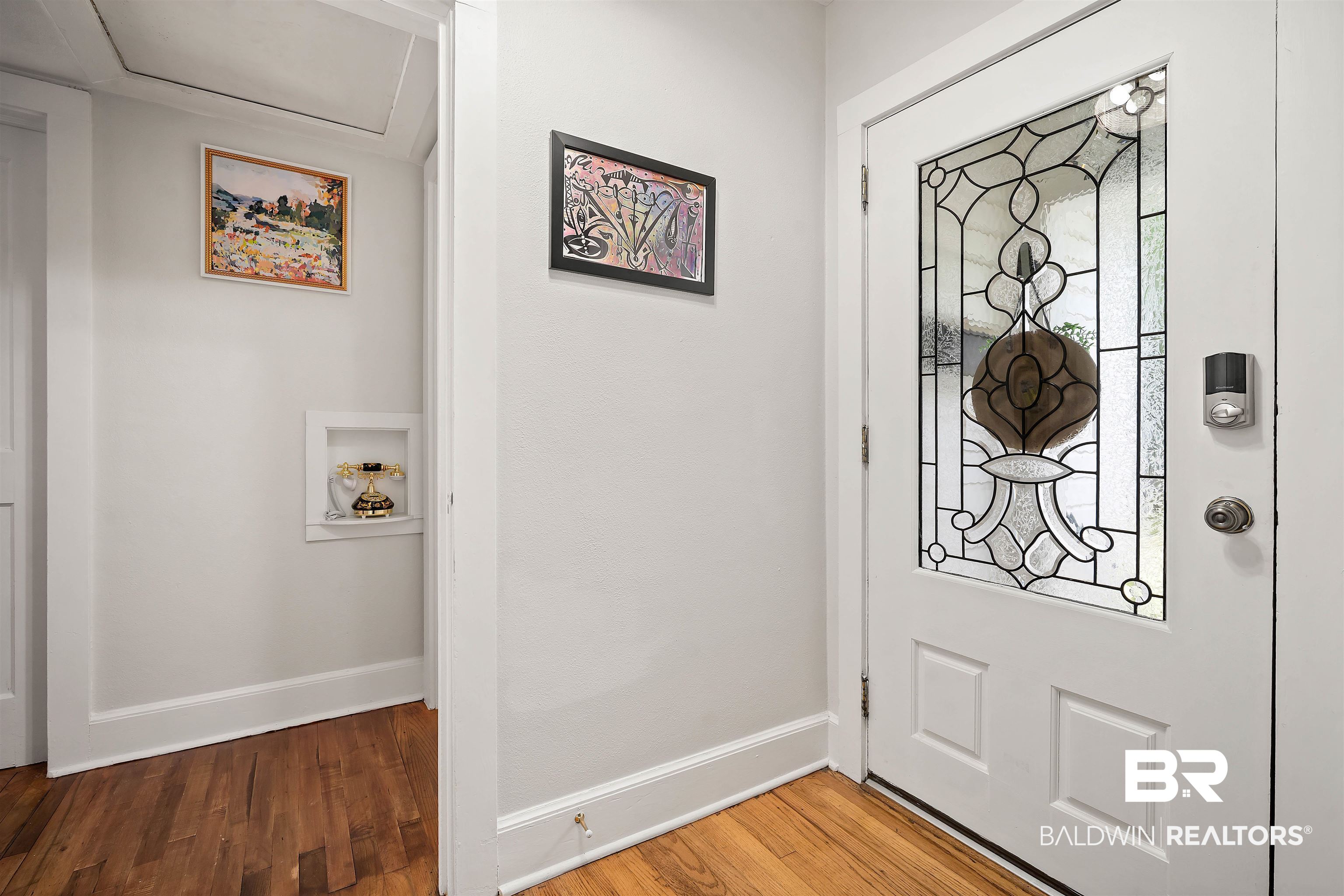 103 Emogene Place Mobile, AL 36606 - Photo 24 of 32 Foyer with light wood finished floors and baseboards