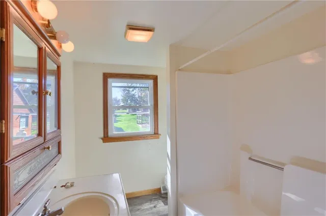 a view of a bathroom with windows