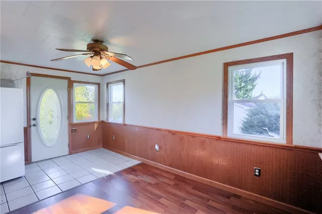 a view of livingroom with furniture and a window
