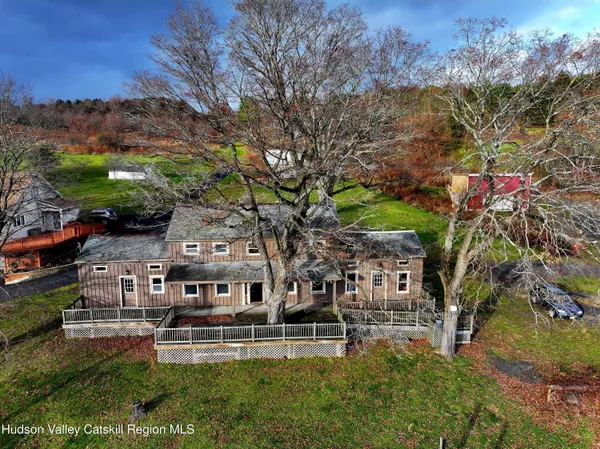 a aerial view of a house with a big yard