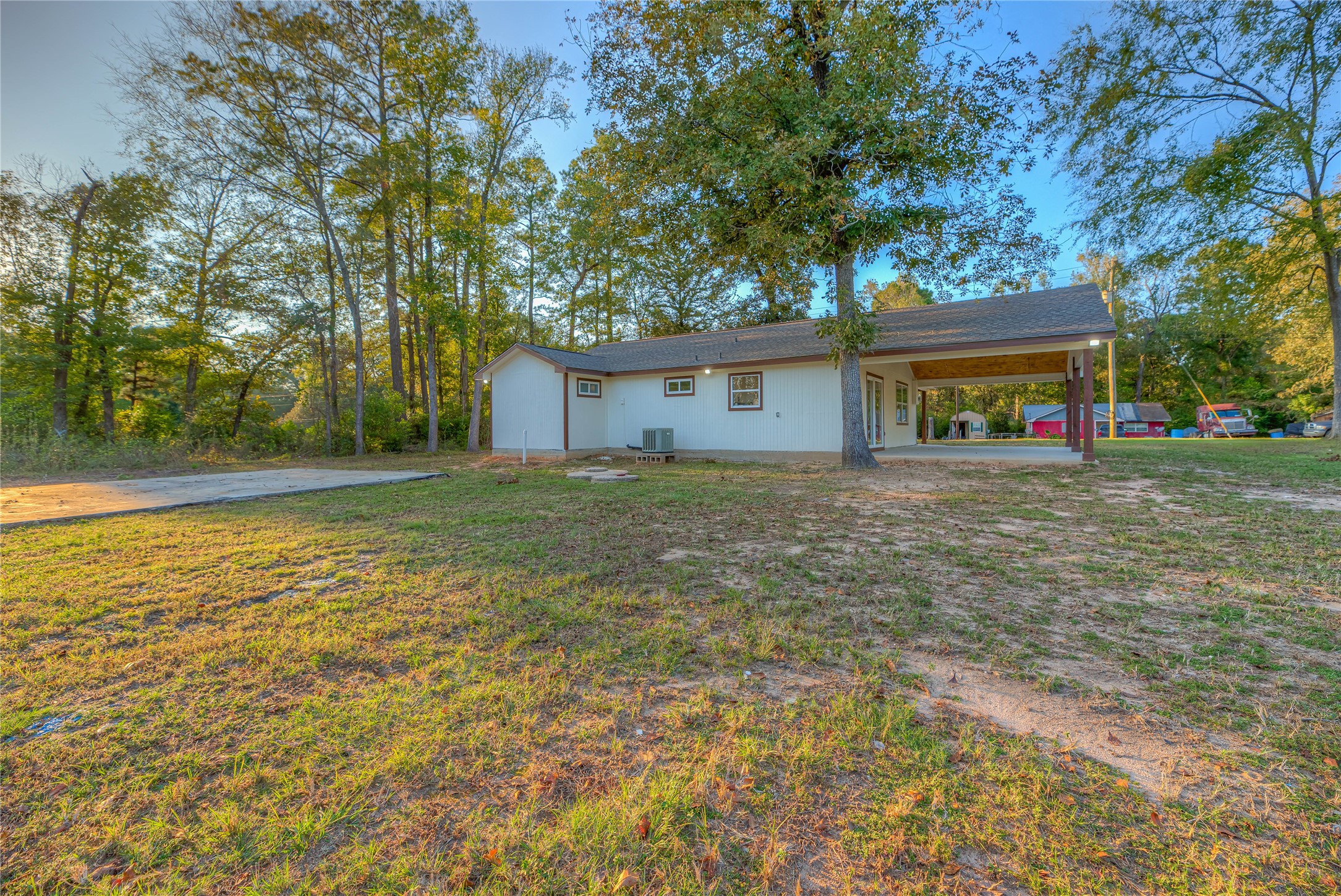 388 Sunrise Wood Road Goodrich, TX 77335 - Photo 32 of 33 a house view with a outdoor space