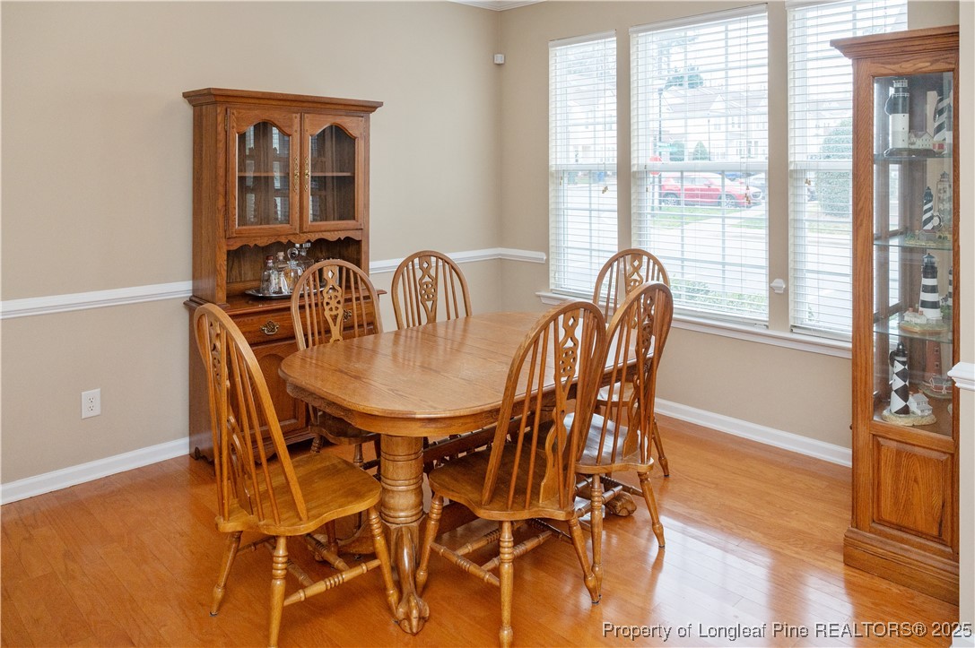 5229 Moonview Court Raleigh, NC 27606 - Photo 12 of 38 a dining room with furniture and window