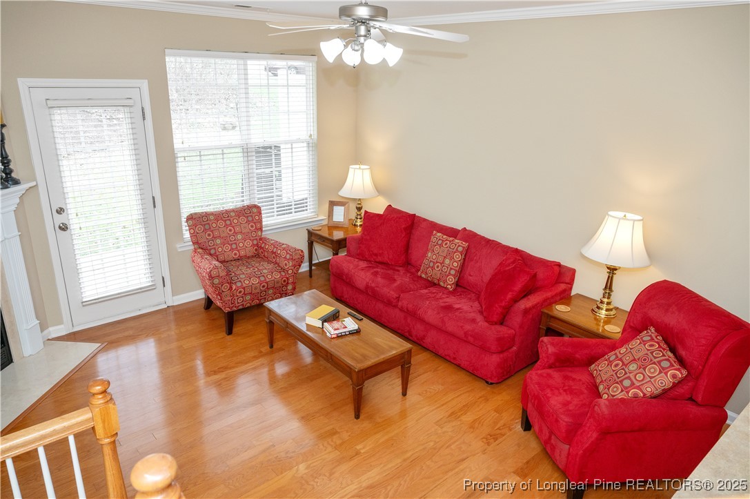 5229 Moonview Court Raleigh, NC 27606 - Photo 14 of 38 a living room with furniture and a window