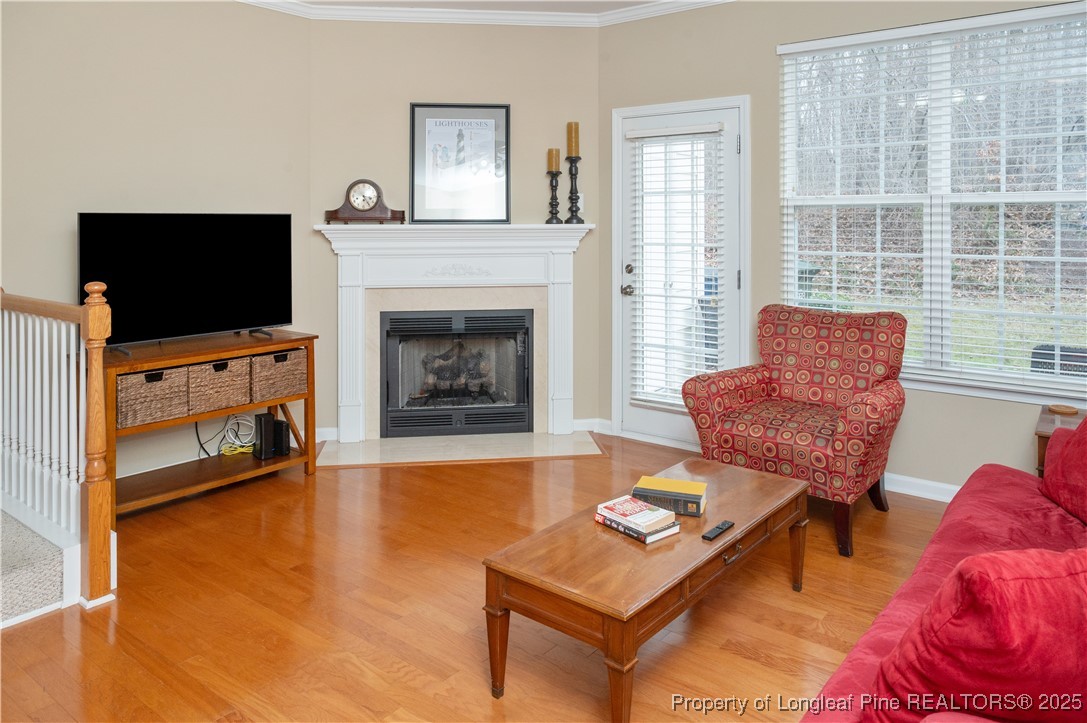 5229 Moonview Court Raleigh, NC 27606 - Photo 15 of 38 a living room with furniture and a fireplace