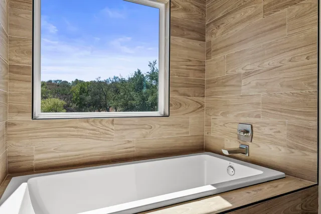 a balcony view with a garden