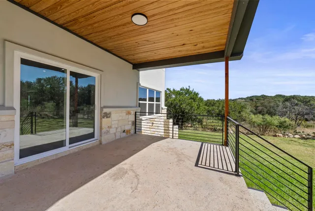 a view of swimming pool with a yard