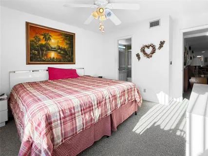 a view of a house with a yard porch and sitting area