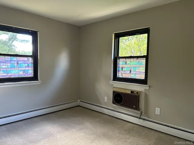 a view of a bathroom with a glass door shower