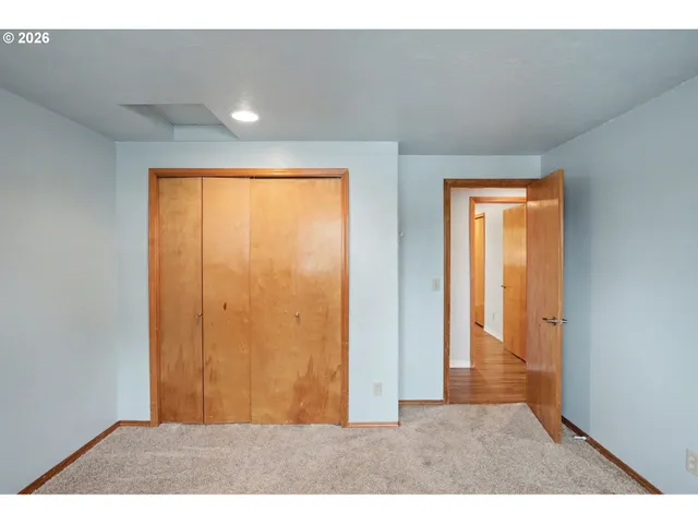 view of empty room with wooden floor