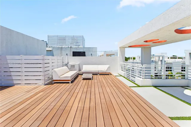 a bedroom with a bed and a night stand