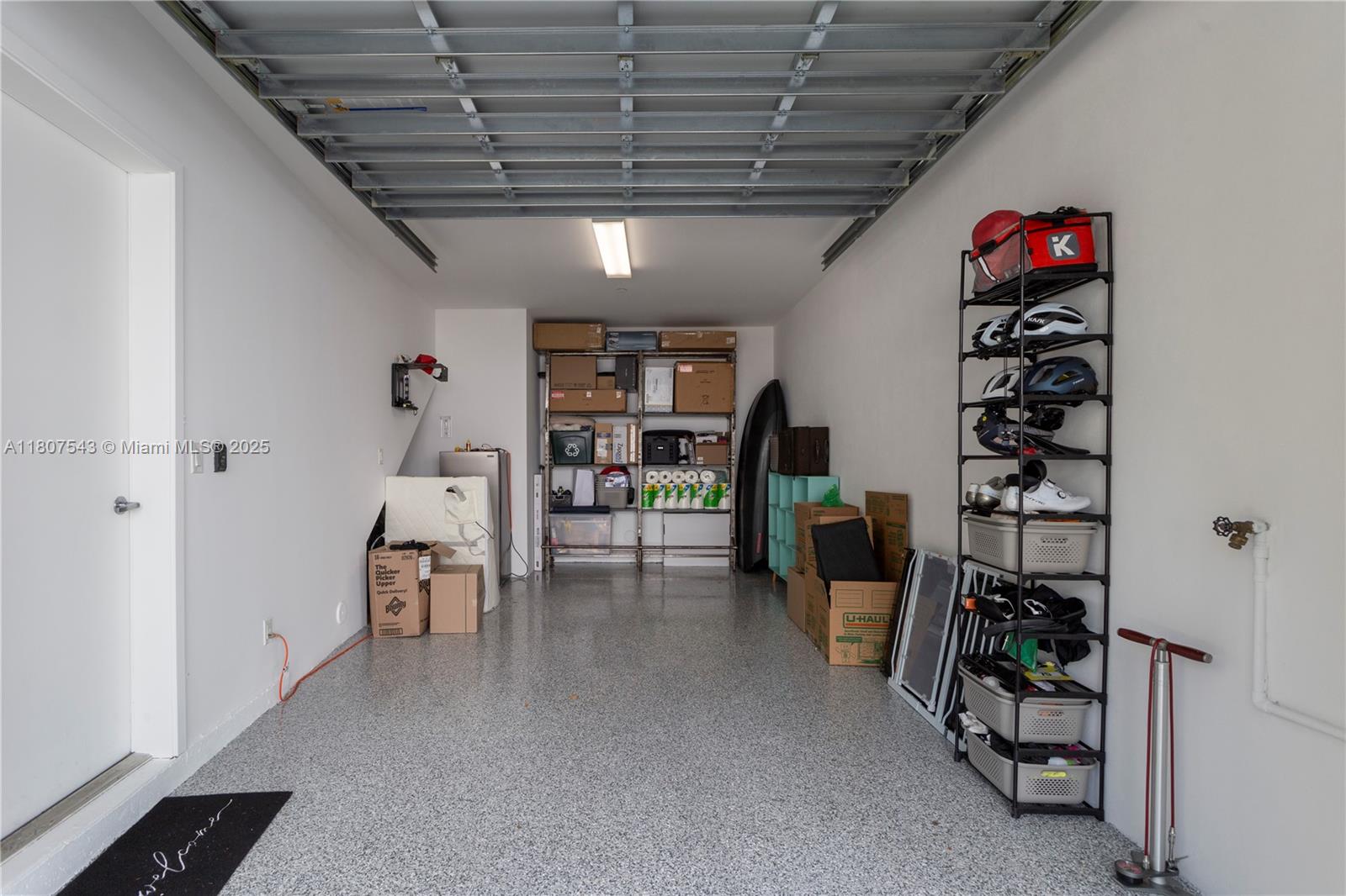 455 Northeast 39th Street, Unit 102 Miami, FL 33137 - Photo 29 of 32 a view of livingroom with furniture and staircase