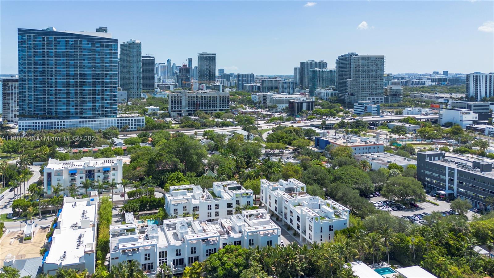 455 Northeast 39th Street, Unit 102 Miami, FL 33137 - Photo 31 of 32 a view of a city with tall buildings
