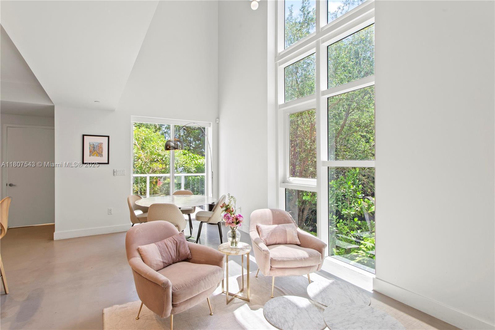 455 Northeast 39th Street, Unit 102 Miami, FL 33137 - Photo 6 of 32 a living room with furniture and a window