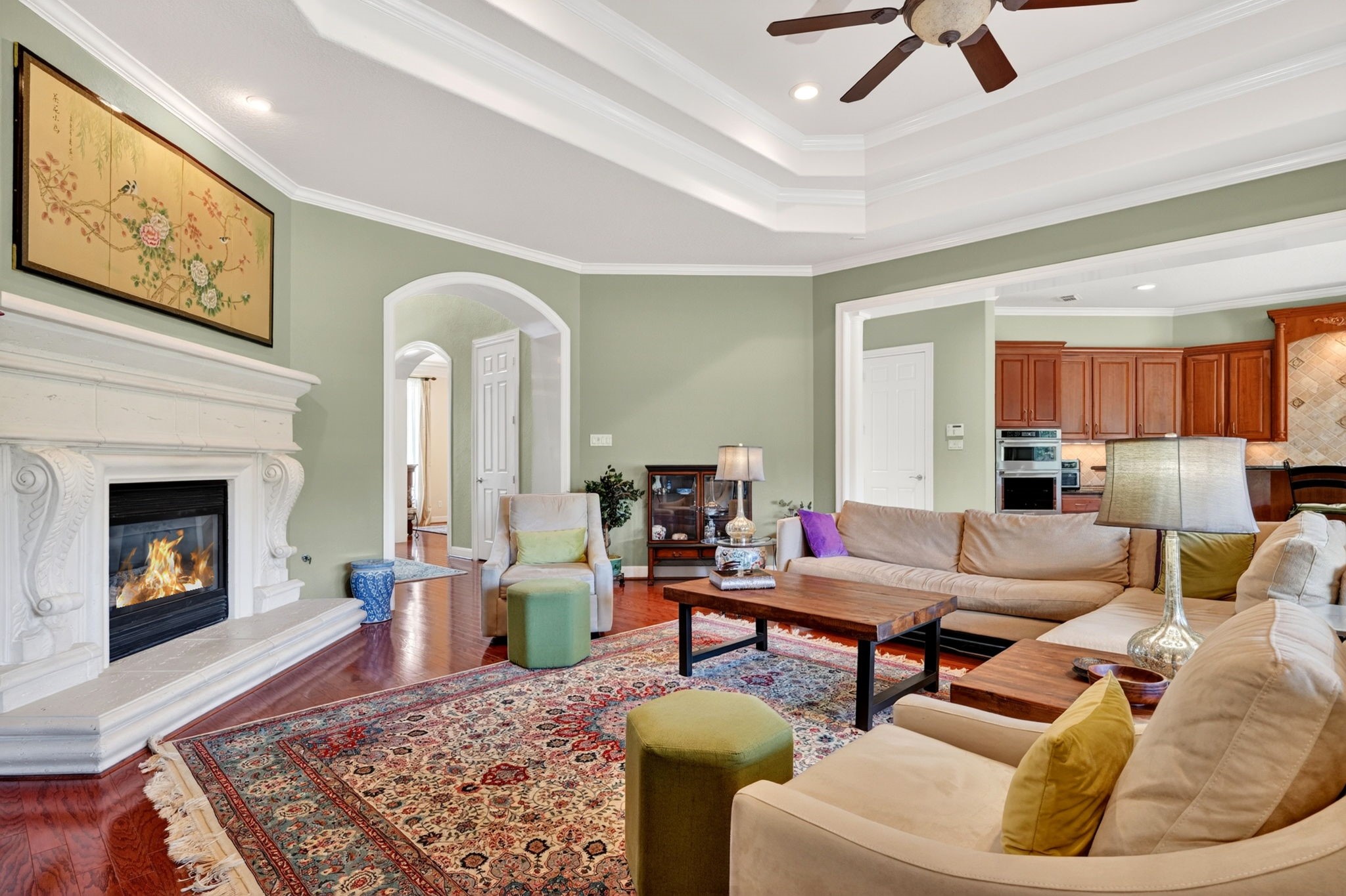15 White Meadow Court Spring, TX 77379 - Photo 9 of 48 Arched entryway to den from foyer. Neutral on trend paint.