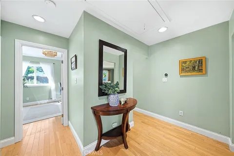 a view of a room with table and chair
