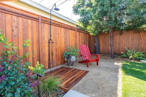 a garden view with a seating space