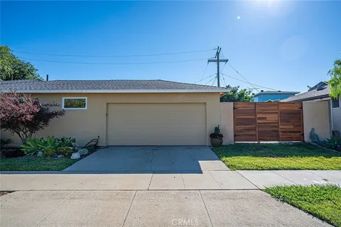 a view of a backyard of the house