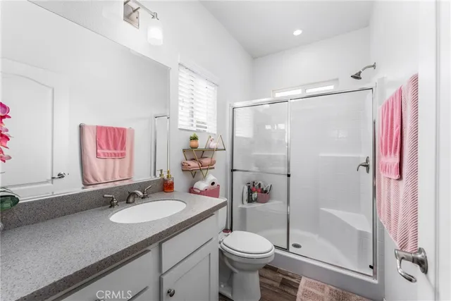 a bedroom with a bed and a table in it