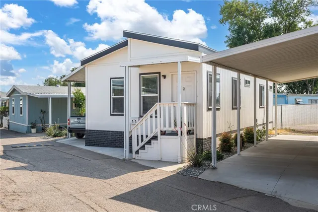 a front view of a house with porch