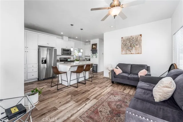 a view of a livingroom with furniture and window