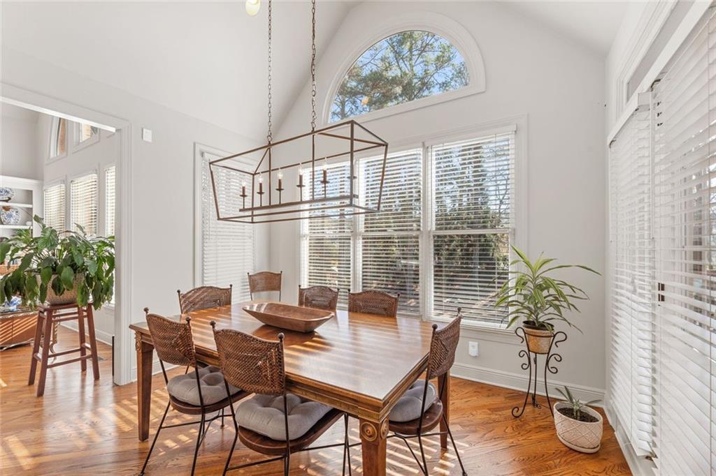 1476 Annapolis Way Grayson, GA 30017 - Photo 15 of 51 a view of a dining room with furniture window and wooden floor