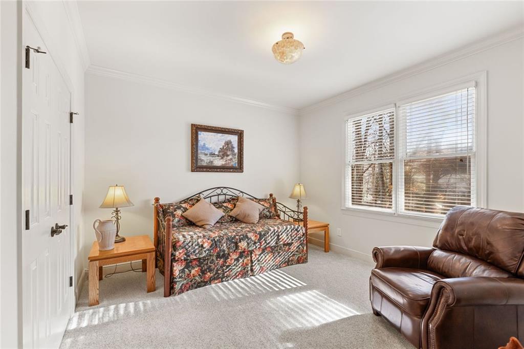1476 Annapolis Way Grayson, GA 30017 - Photo 22 of 51 a bedroom with furniture and a window