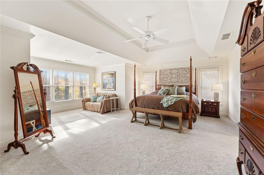 1476 Annapolis Way Grayson, GA 30017 - Photo 26 of 51 a living room with furniture gym equipment and a flat screen tv