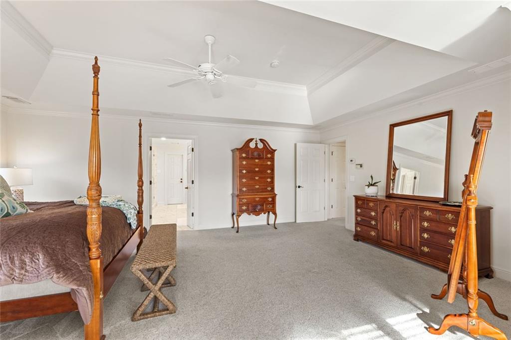 1476 Annapolis Way Grayson, GA 30017 - Photo 27 of 51 a living room with furniture and a dresser
