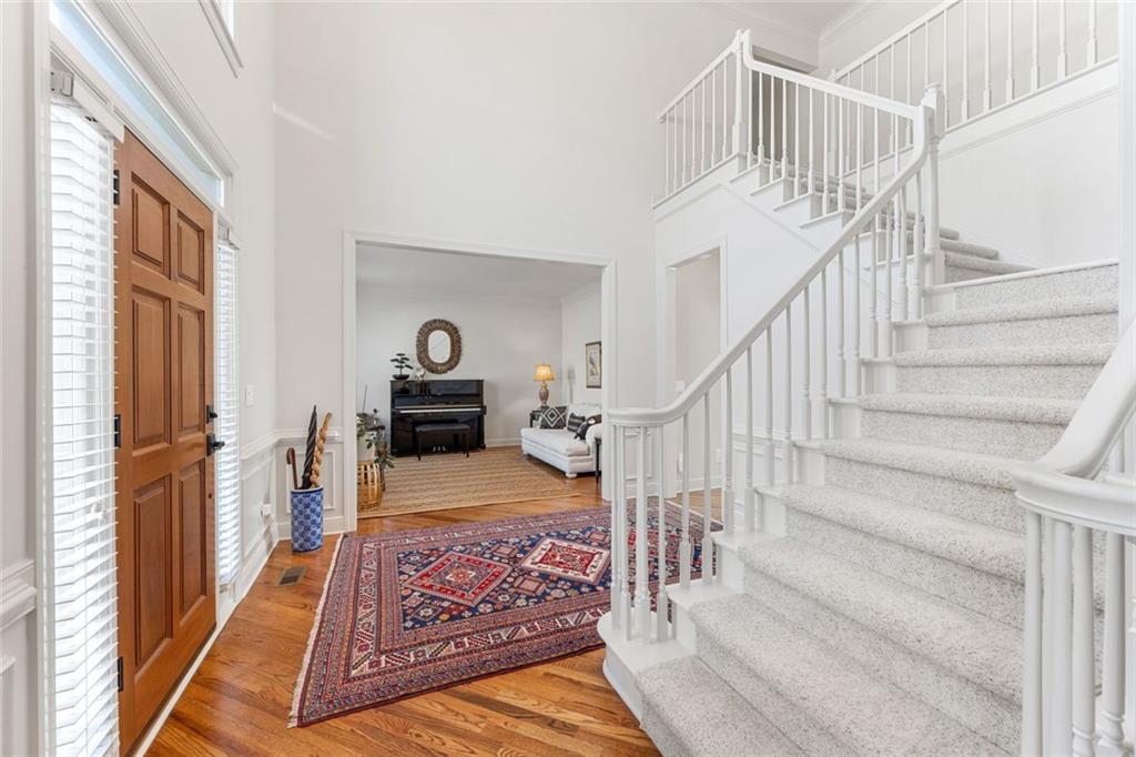 1476 Annapolis Way Grayson, GA 30017 - Photo 4 of 51 a view of entryway and hall with wooden floor