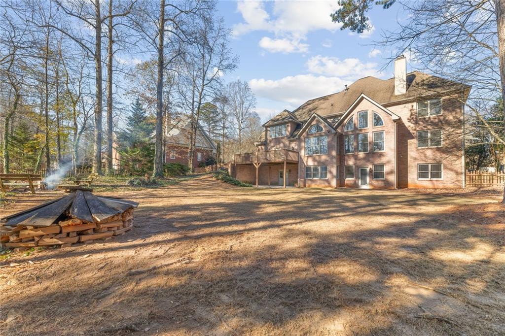 1476 Annapolis Way Grayson, GA 30017 - Photo 49 of 51 a view of a building with snow on the road