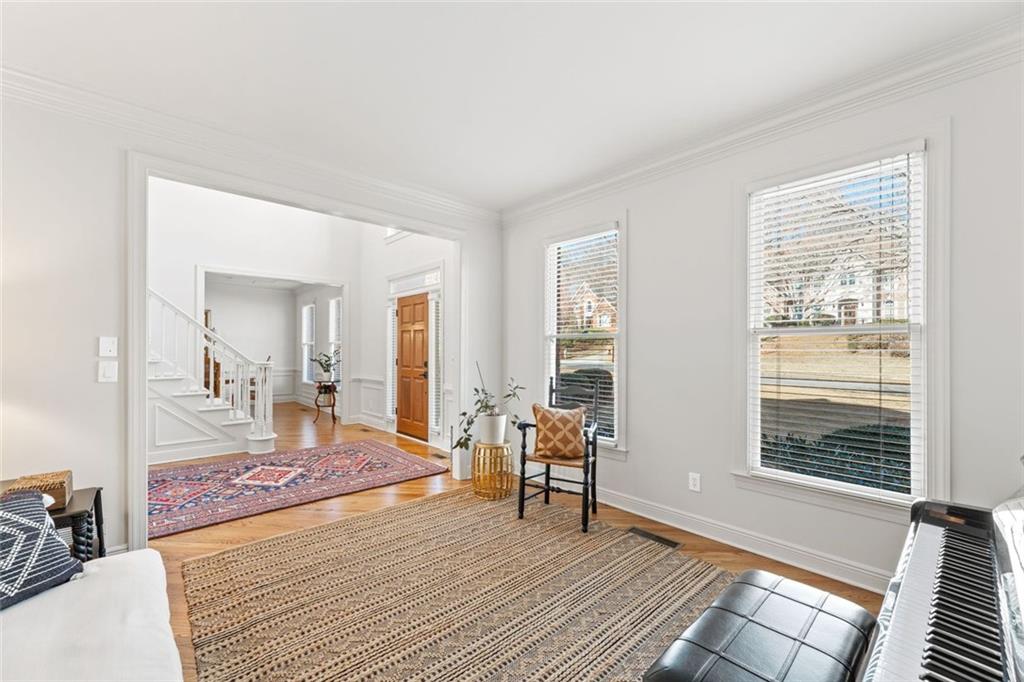 1476 Annapolis Way Grayson, GA 30017 - Photo 7 of 51 a living room with furniture and a table