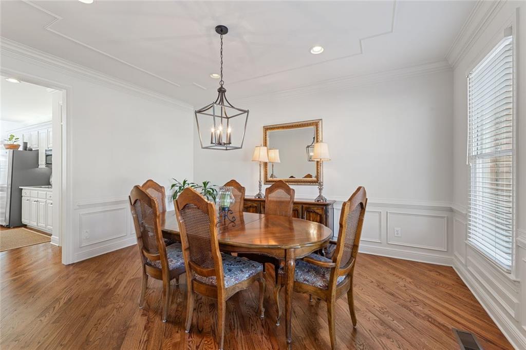 1476 Annapolis Way Grayson, GA 30017 - Photo 8 of 51 a view of a dining room with furniture window and wooden floor