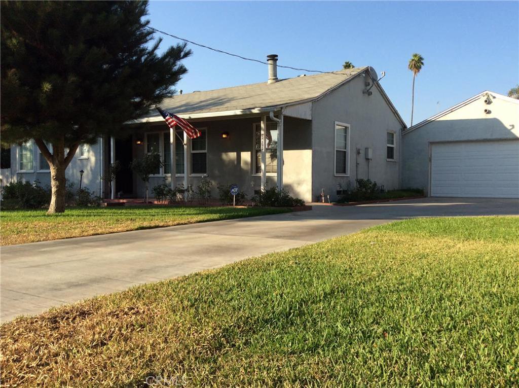 3477 McKinley Street Riverside, CA 92506 - Photo 1 of 1 a view of a house with a swimming pool