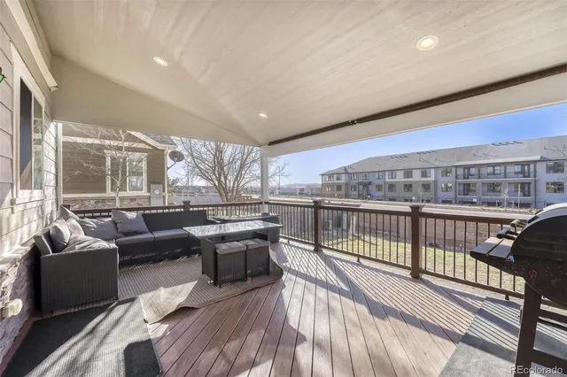 a view of a living room and a wooden floor
