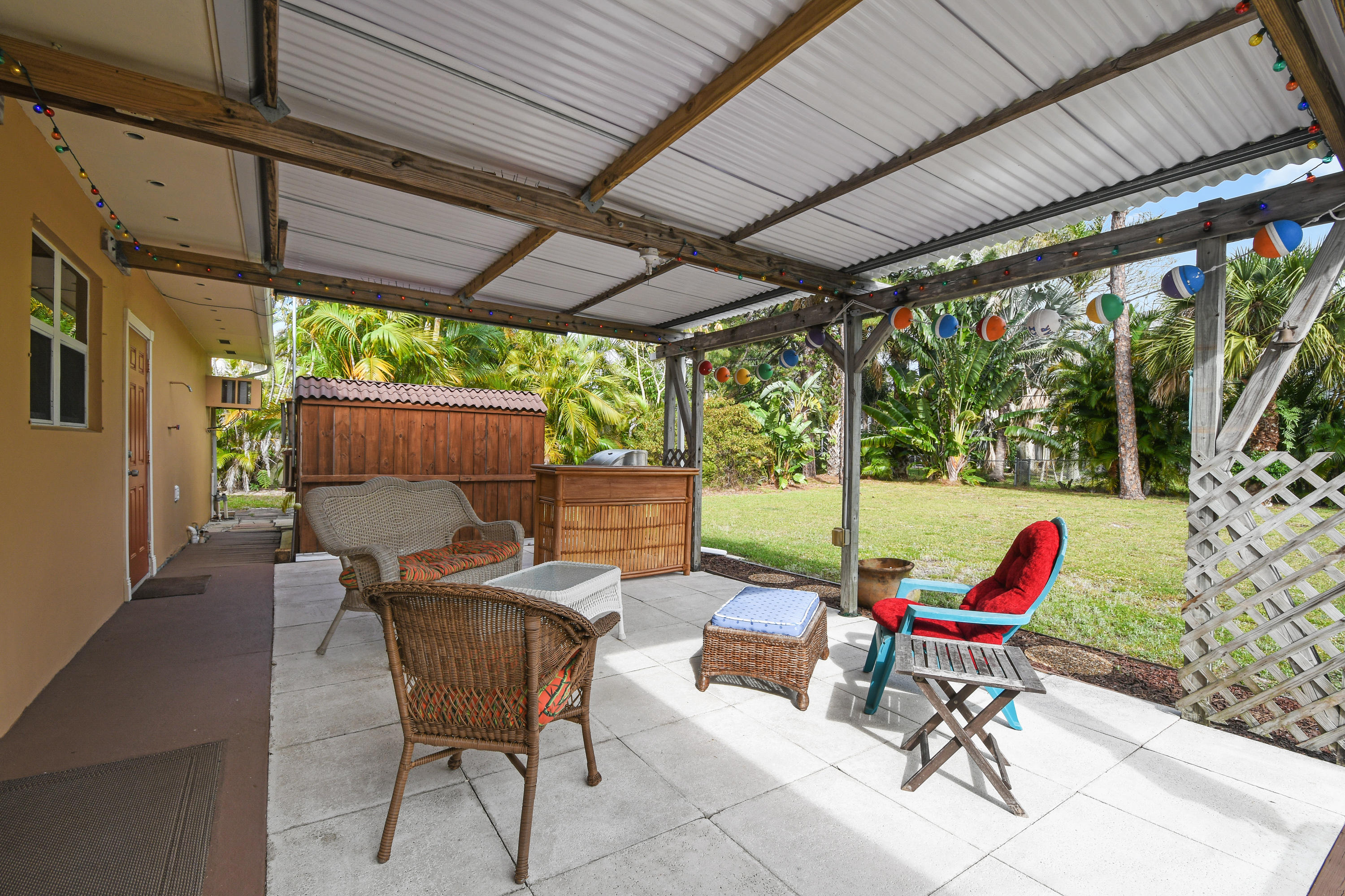 4885 Tequesta Drive Tequesta, FL 33469 - Photo 23 of 48 Covered Patio