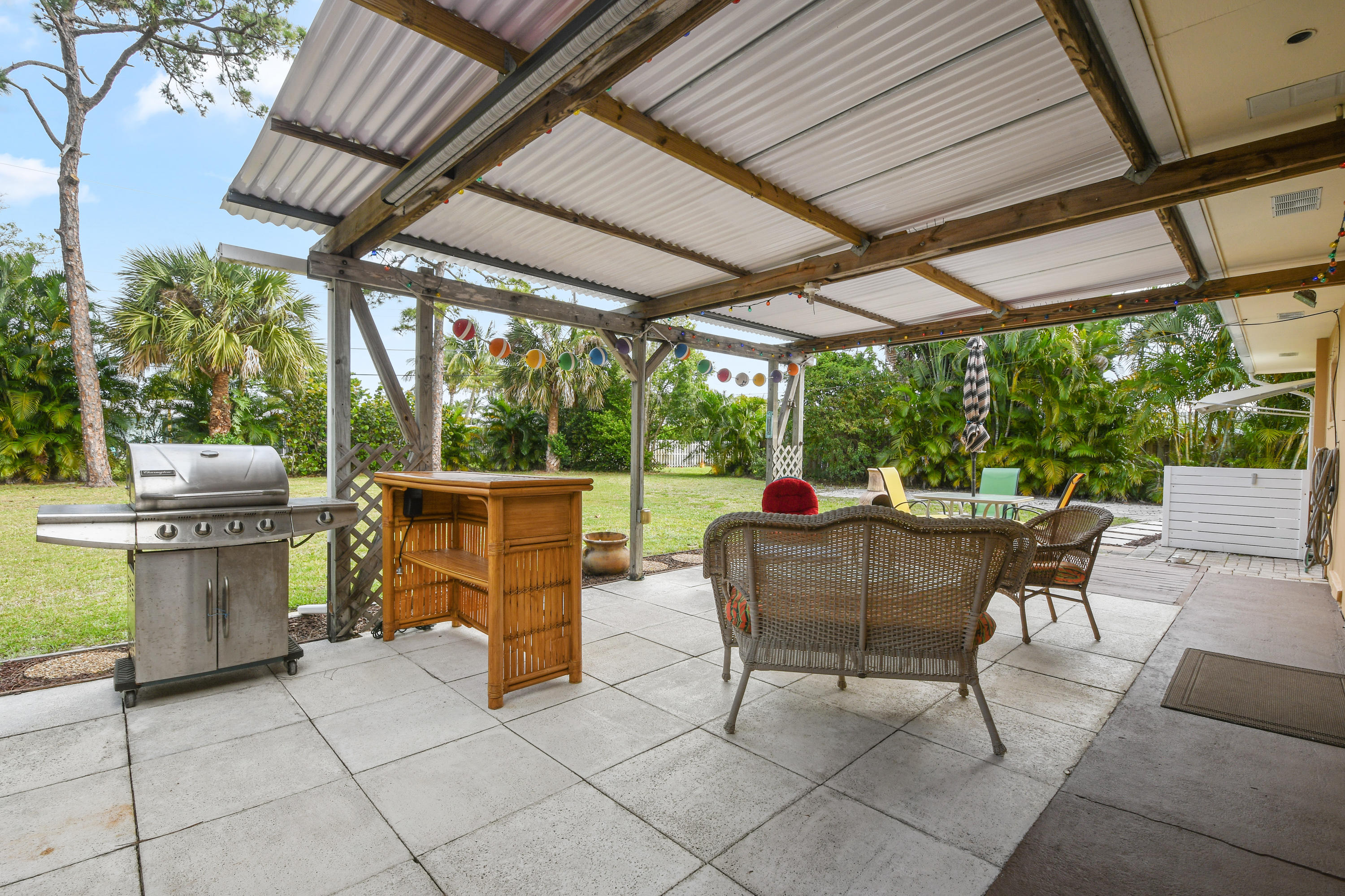 4885 Tequesta Drive Tequesta, FL 33469 - Photo 24 of 48 Covered Patio