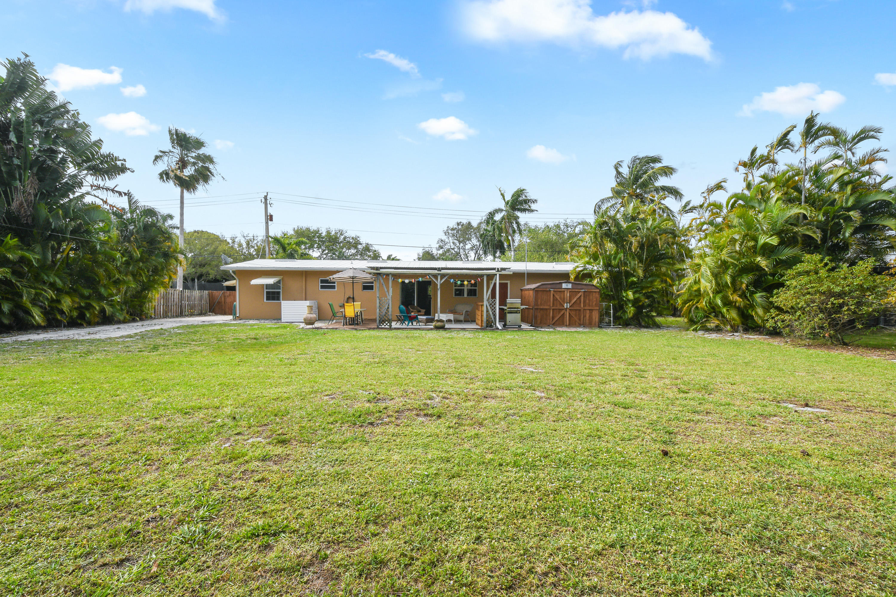 4885 Tequesta Drive Tequesta, FL 33469 - Photo 28 of 48 Rear View of Home