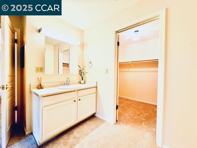 5425 Concord Boulevard, Unit F4 Concord, CA 94521 - Photo 14 of 17 a bathroom with a sink and a mirror