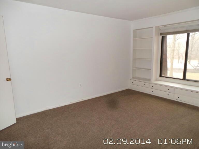5253 West Running Brook Road, Unit 201 Columbia, MD 21044 - Photo 9 of 9 a view of an empty room with a window