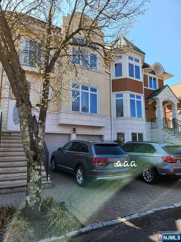 a car parked in front of a house