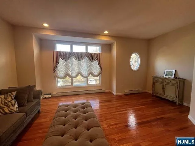 a view of a livingroom with furniture and window