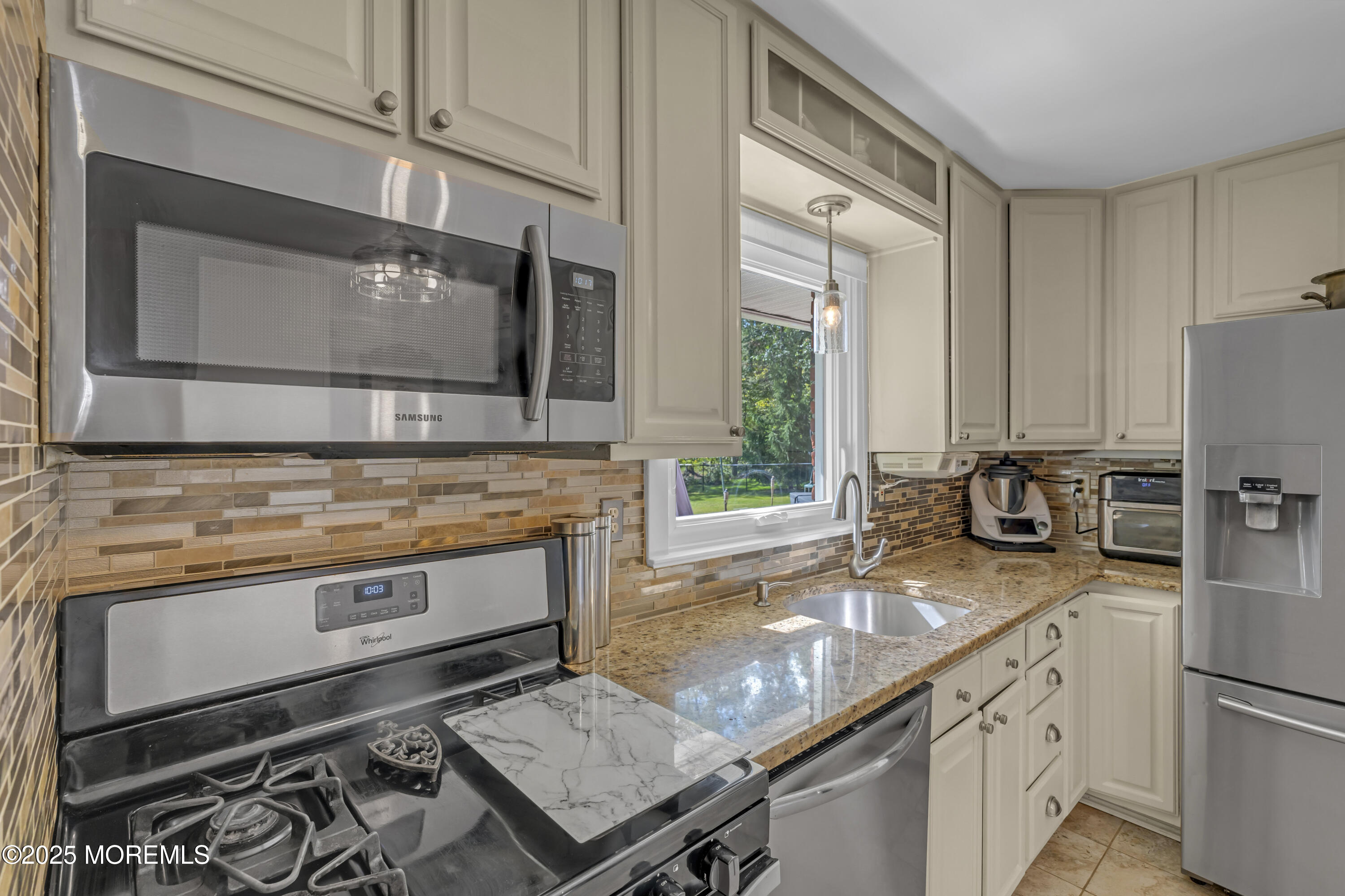 13 Mountview Road Morris Plains, NJ 07950 - Photo 12 of 59 a kitchen with stainless steel appliances granite countertop a stove a sink and a microwave