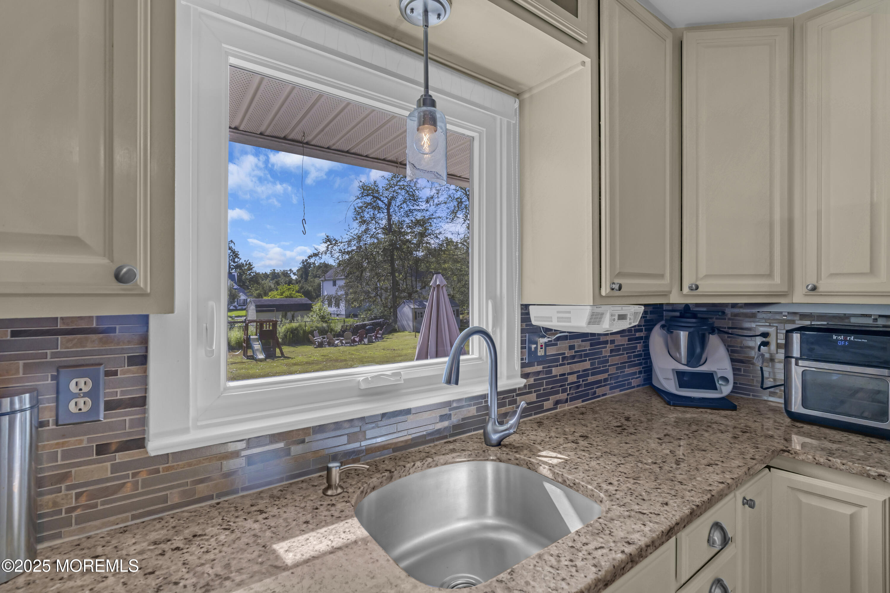 13 Mountview Road Morris Plains, NJ 07950 - Photo 13 of 59 a kitchen with granite countertop a sink and a window