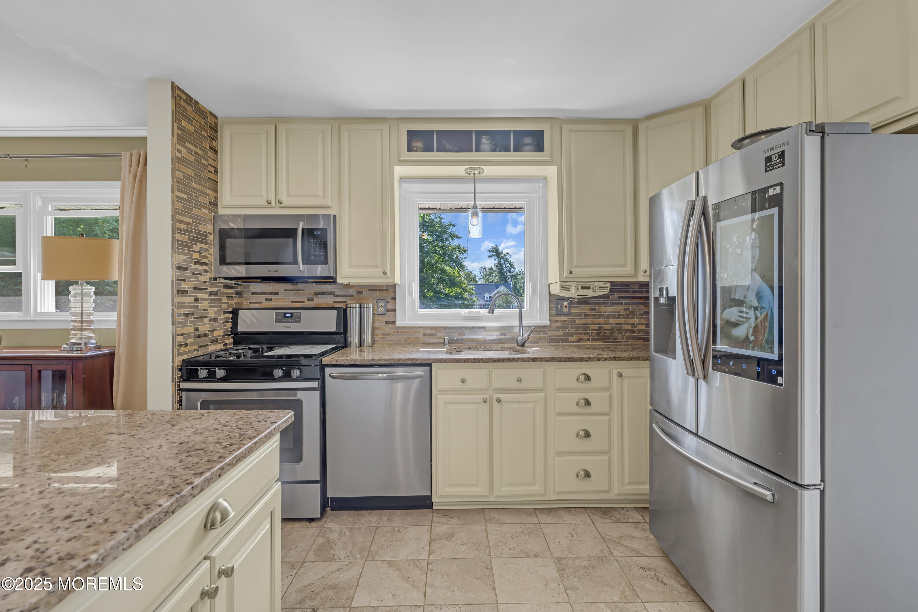 13 Mountview Road Morris Plains, NJ 07950 - Photo 18 of 59 a kitchen with stainless steel appliances granite countertop a refrigerator stove microwave and sink