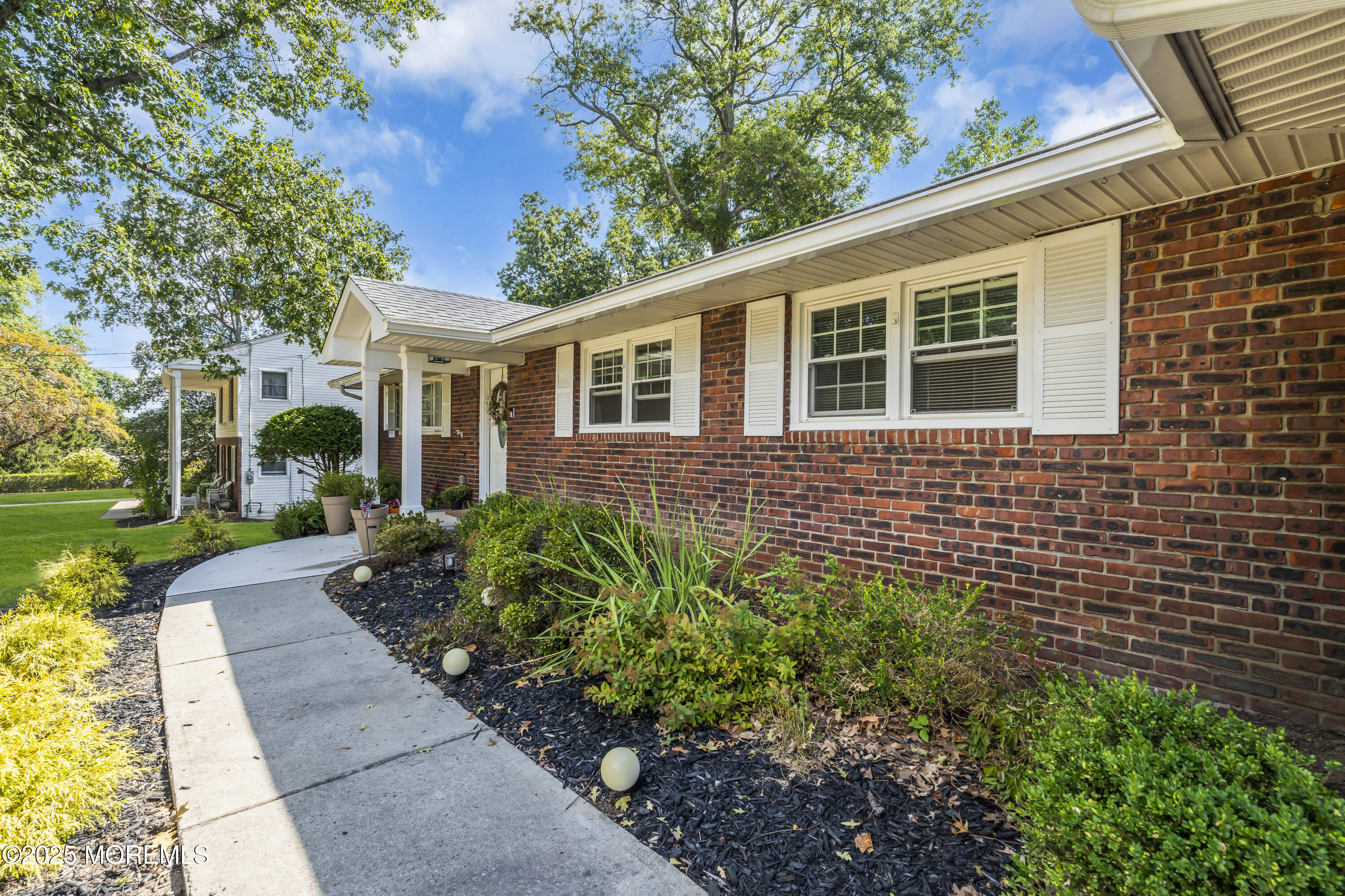 13 Mountview Road Morris Plains, NJ 07950 - Photo 2 of 59 a front view of a house with garden