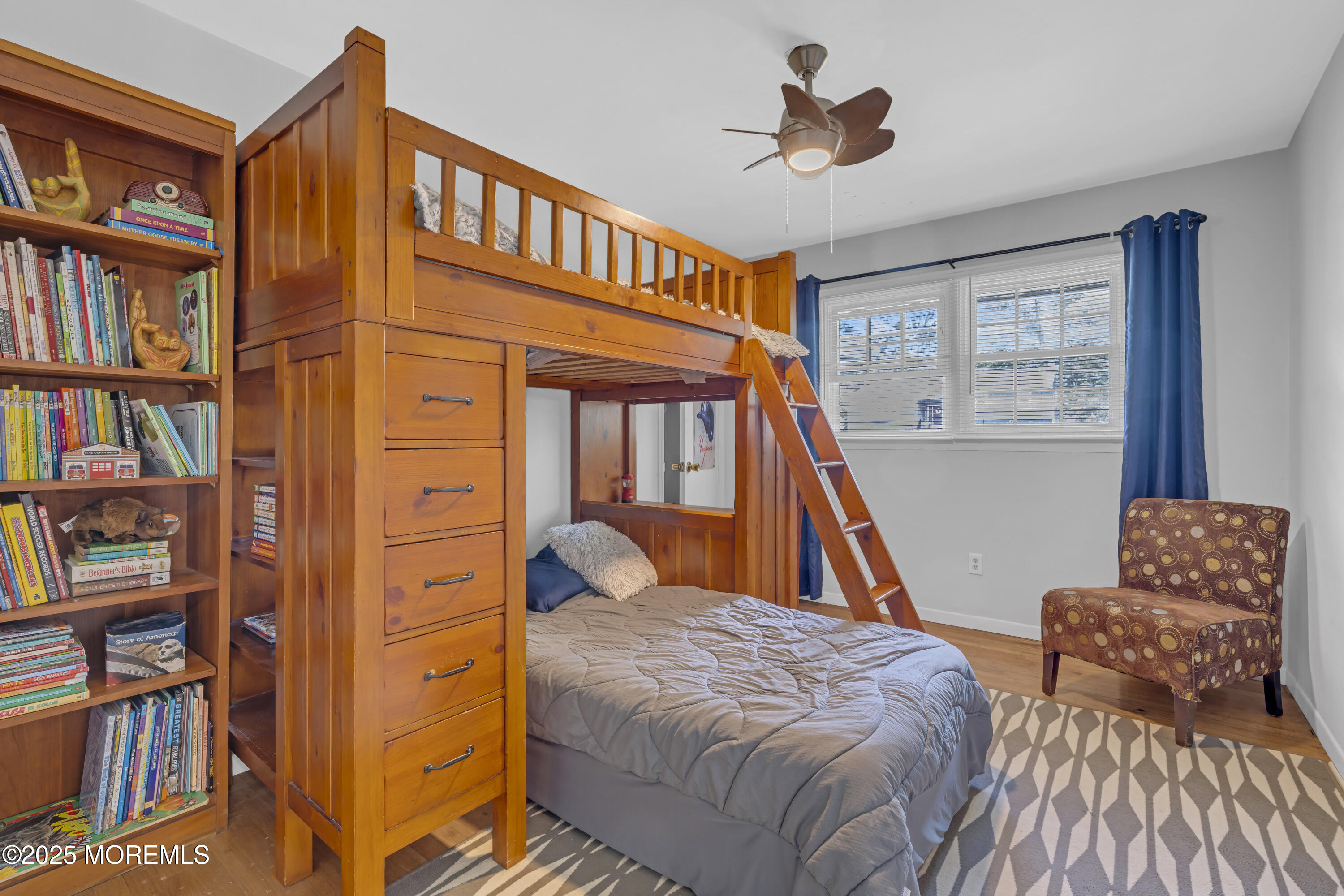 13 Mountview Road Morris Plains, NJ 07950 - Photo 32 of 59 a bed room with a bed and a book shelf