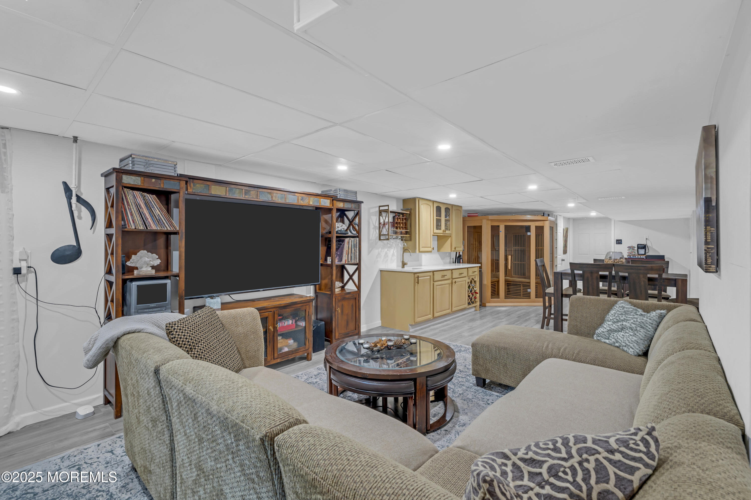 13 Mountview Road Morris Plains, NJ 07950 - Photo 40 of 59 a living room with furniture and a flat screen tv