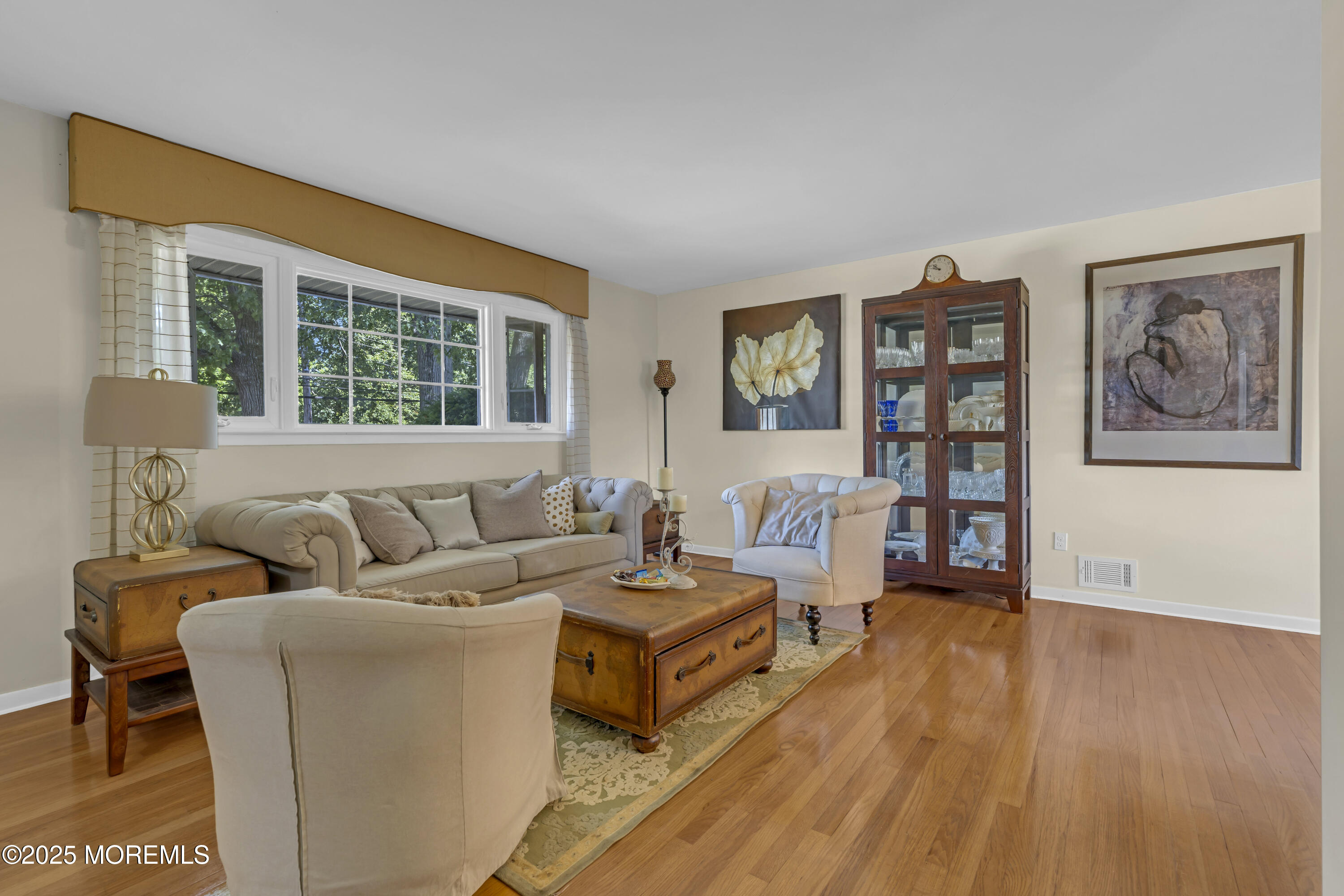 13 Mountview Road Morris Plains, NJ 07950 - Photo 5 of 59 a living room with furniture and a large window