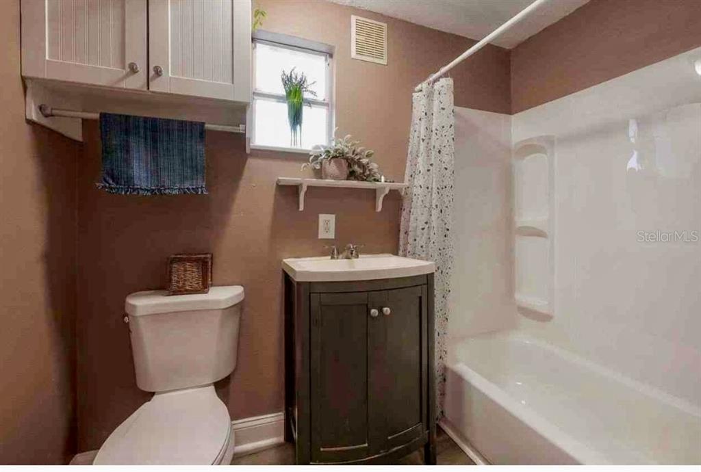 2322 West Cherry Street Tampa, FL 33607 - Photo 13 of 31 a bathroom with a sink a toilet and shower